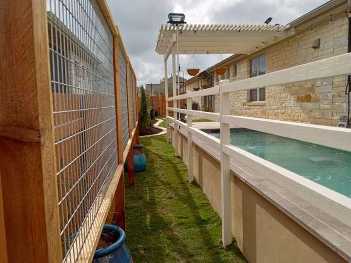 Cedar trellis and privacy fence along a pool